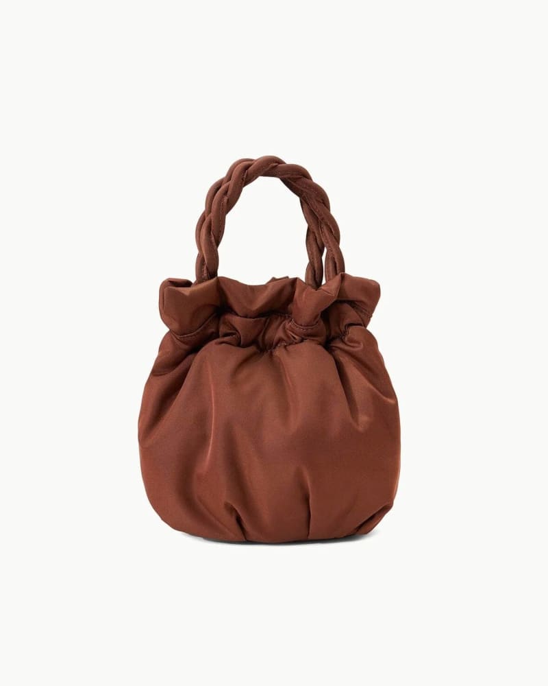 Front of a size O/S Grace Bag in Clove in Clove by STAUD. | dia_product_style_image_id:328792